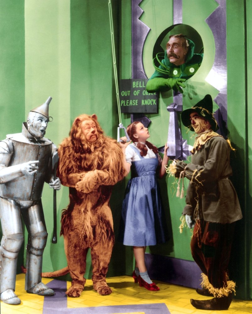 Bell out of order, please knock - Ray Bolger, Judy Garland, Jack Haley and Bert Lahr in The Wizard of Oz - not to forget Frank Morgan, who played the doorman, as well as the horseman driving the "horse of another color" in the following scene, and the Wizard of Oz himself.