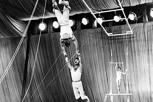 Trapeze act in "The Big Circu"