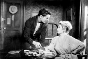 Nightmare Alley - Tyrone Power tries to get the secret of the code from Joan Blondell