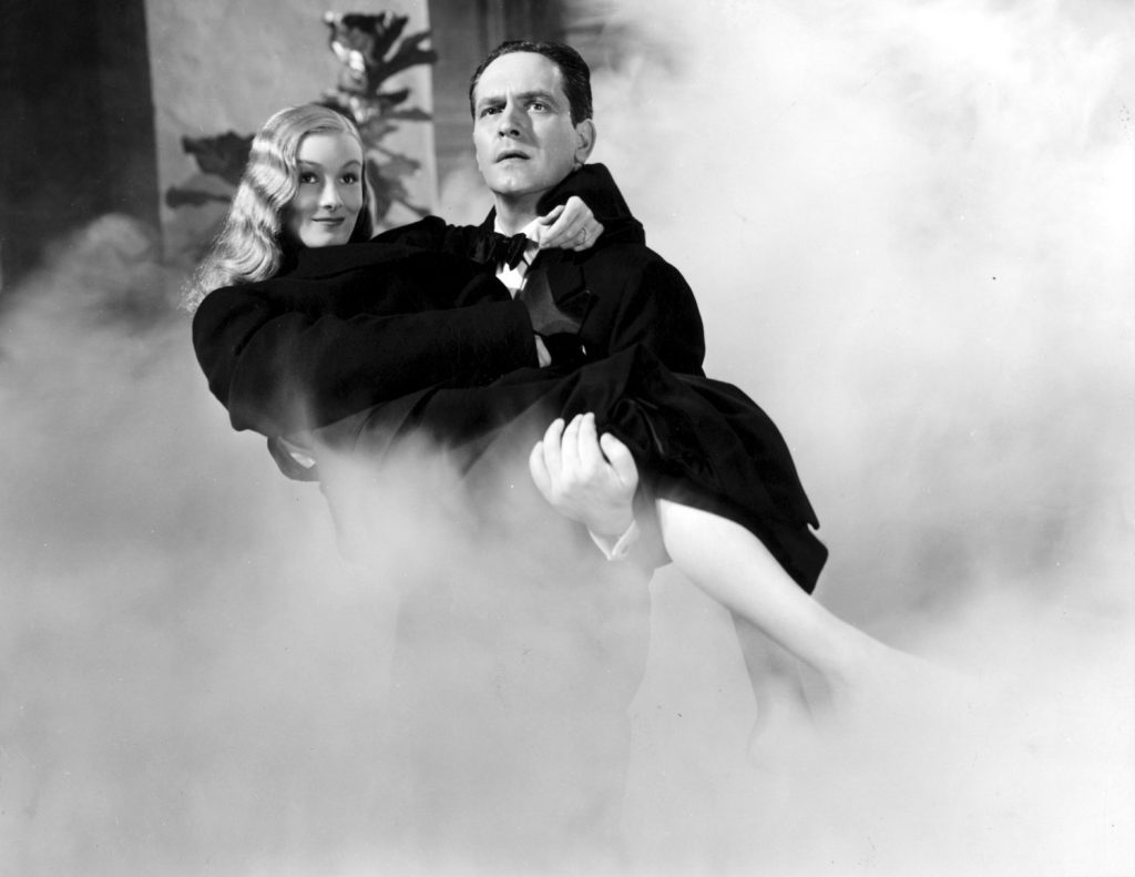 Frederic March rescues Veronic Lake from a burning hotel in I Married a Witch