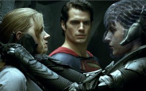 Superman (Henry Cavill) is caught between Lois Lane (Amy Adams) and the villainess Faora Ul
