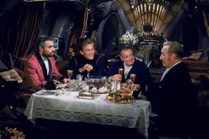 In 20,000 Leagues Under the Sea, James Mason, Kirk Douglas, Peter Lorre and Paul Lukas discuss over dinner