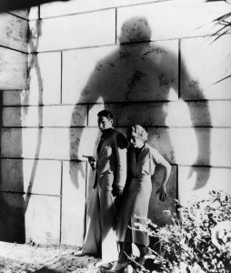 The shadow of one of Moreau's beast-men overshadow Monroe and Ruth