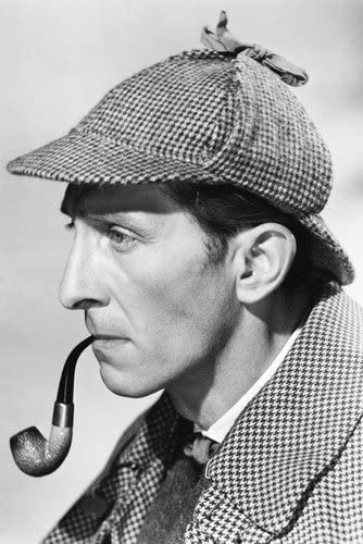 Peter Cushing,the Hound of the Baskervilles classic Sherlock Holmes with pipe