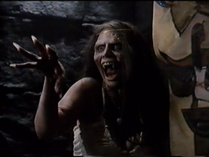 Michelle Bauer as the monster in The Tomb