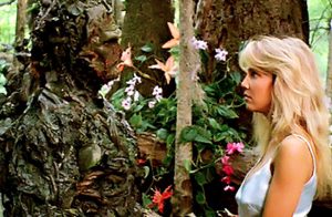 Swamp Thing (Dick Durock) and Heather Locklear