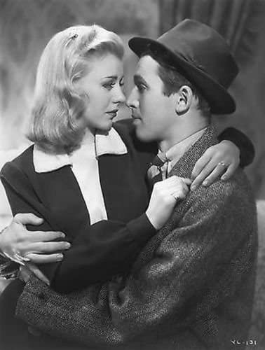 Ginger Rogers looks lovingly at Jimmy Stewart in Vivacious Lady