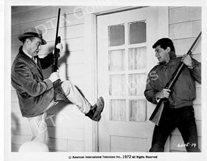 Ray Milland and Frankie Avalon, armed with shotguns, breaking in - "Panic in the Year Zero"