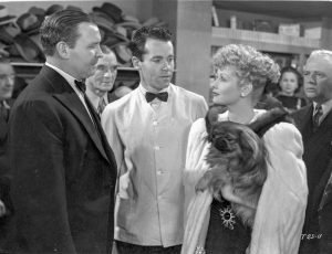 At the nightclub, a scene between the mobster and his "moll" Lucille Ball - as Henry Fonda looks on helplessly