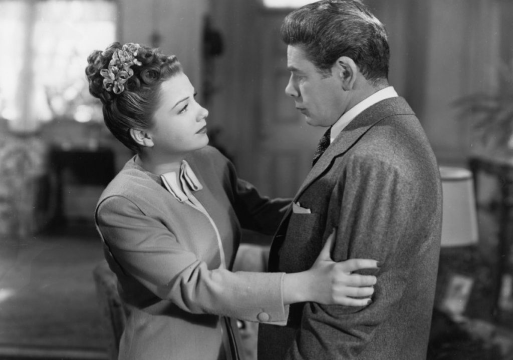Anne Baxter as the Judge's fiancee with Paul Muni in his body