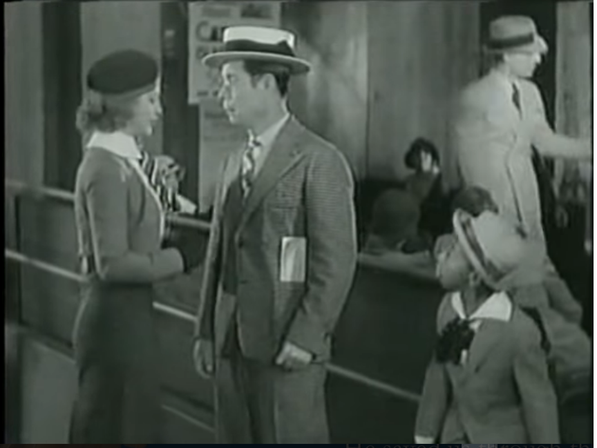 Alice Brandon (Ginger Rogers) meets Joe Holt (Joe E. Brown) as Sam (Farina) looks on