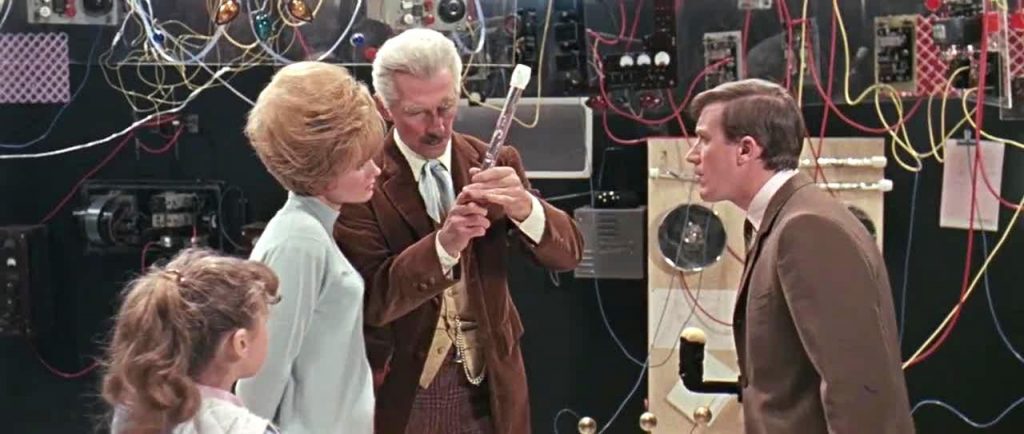 Doctor Who (Peter Cushing) and his companions inside the TARDIS