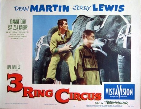 Dean Martin and Jerry Lewis watering the elephants in 3 ring Circus
