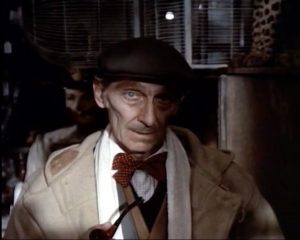 Peter Cushing as the proprietor of the Temptations antique shop in "From Beyond the Grave"
