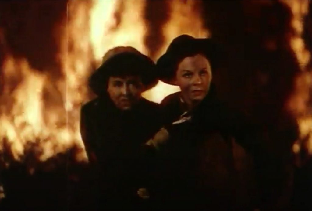 Celia (Paulette Goddard) and Tana (Susan Hayward) trapped in a forest fire at the climax of "The Forest Rangers"