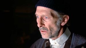 Peter Cushing as the old garbage man in "Tales from the Crypt"