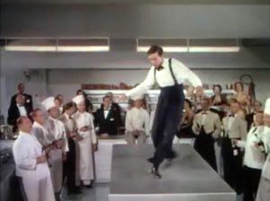 Ray Bolger dancing on the kitchen table in "April in Paris"