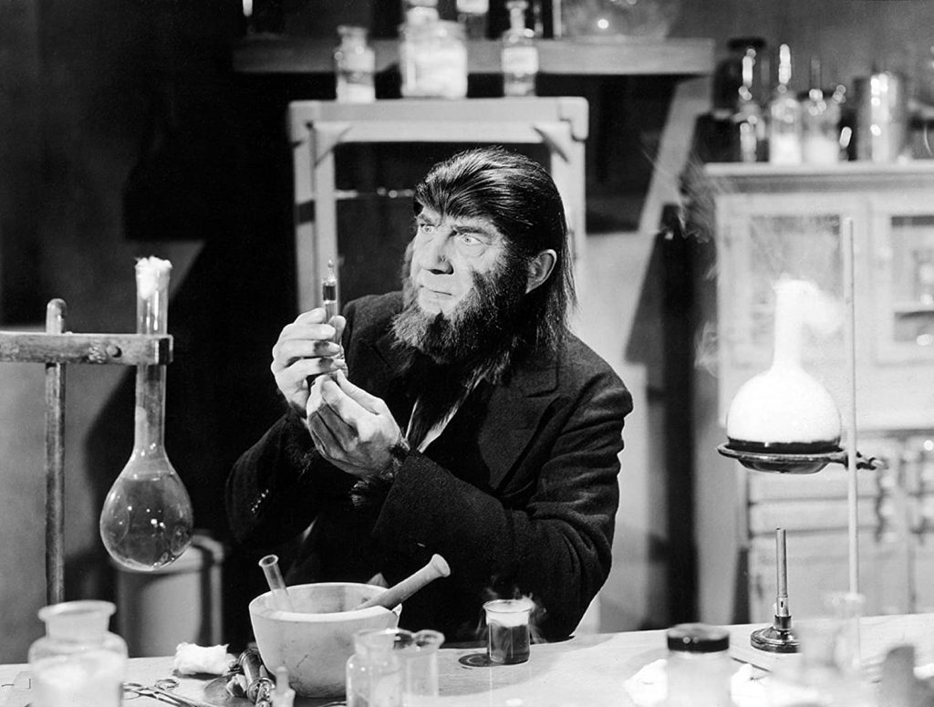 Bela Lugosi as The Ape Man, in his laboratory