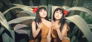Mothra's twin fairies sing a ballad - on a television show! in "Ghidorah the Three-Headed Monster"