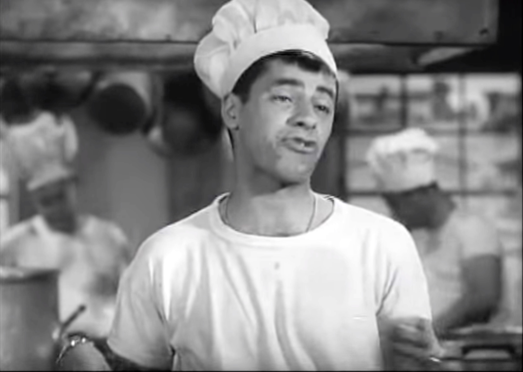 Jerry Lewis singing "The Navy gets the gravy, but the Army gets the beans"