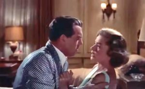 Sid and Elizabeth (Fred MacMurray, Lauren Bacall) in "Woman's World"