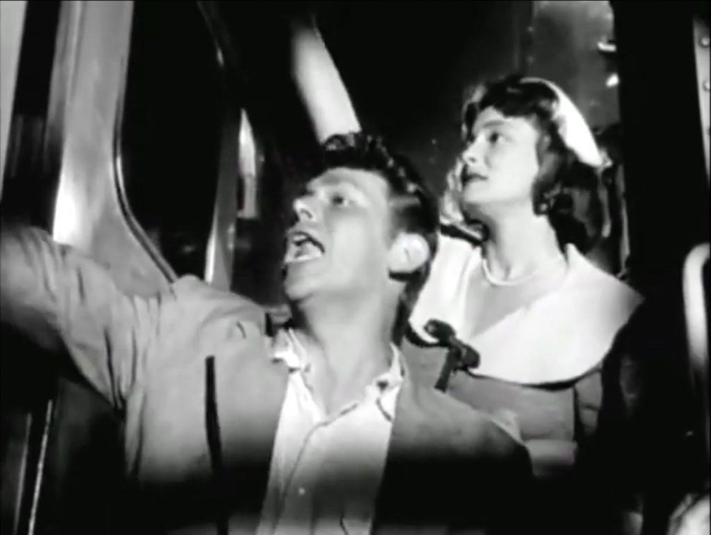 Lonesome Rhodes & Marcia waving goodbye to the crowd in "A Face in the Crowd"