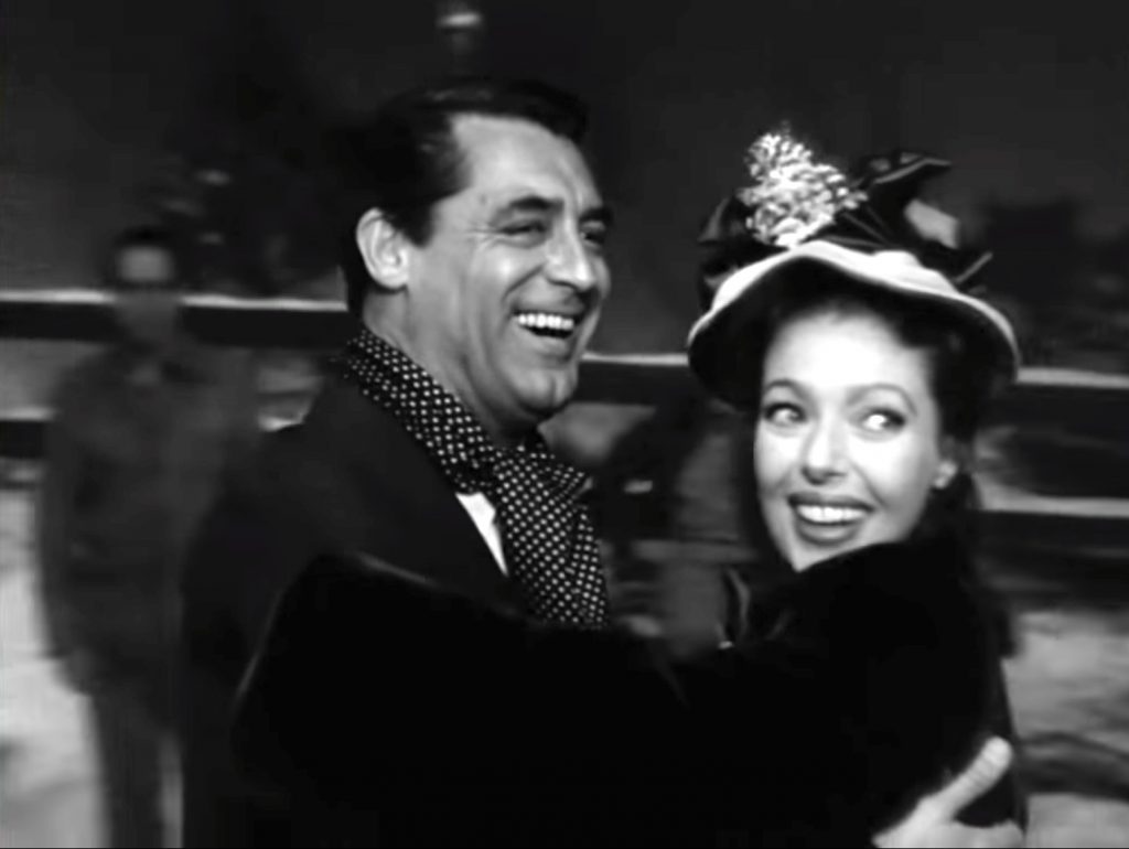 Dudley and Julia skating in "The Bishop's Wife"