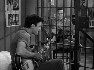 The Guitar Player - The Andy Griffith Show, season 1. A hometown guitar player auditions with a dance band in the Mayberry jail. With Sheriff Andy Taylor's help.