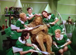 The Cowardly Lion getting a manicure in "The Wizard of Oz"