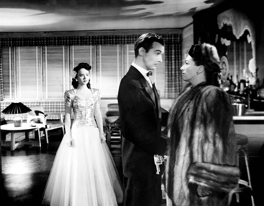 Veda, Monte, and Mildred Pierce in a shattering moment