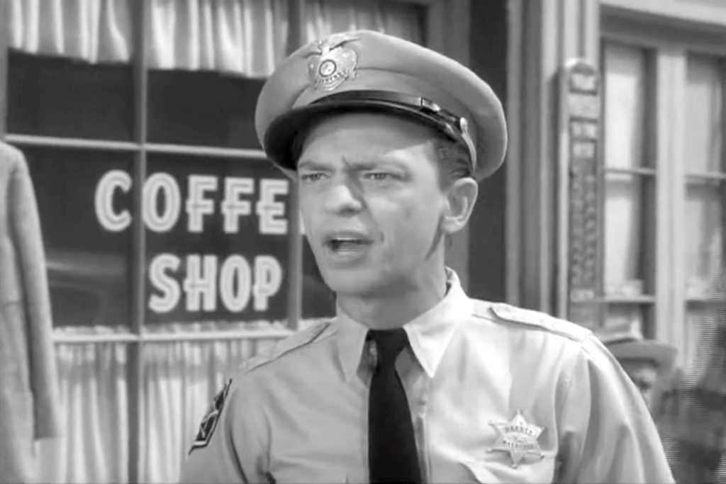 Deputy Barney Fife (Don Knotts) - "Are you trying to bribe an officer?"