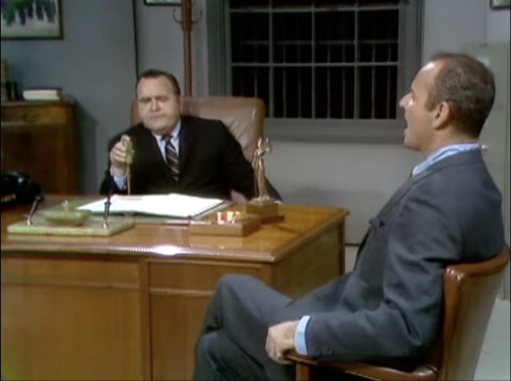 Jonathon Winters as the prison warden interviewed by Harvey Korman in the "Wonderful World of Prisons" segment of The Carol Burnett Show