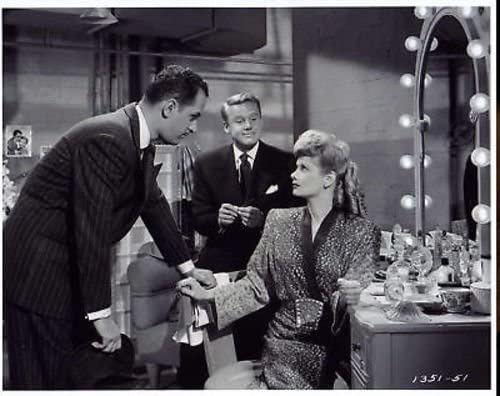 Keenan Wynn trying to convince Lucille Ball while Van Johnson watches