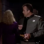 Michael Garibaldi annoying a female reporter in "Infection" - Babylon 5 season 1