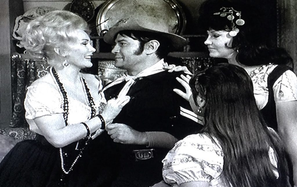 Gypsy Zsa Zsa Gabor tells Corporal Agarn (Larry Storch) that he's the tribe's long-lost prince in "Play, Gypsy, Play" Wrangler Jane (Melody Patterson) buying a dress in "The Courtship of Wrangler JanThe Courtship of Wrangler Jane" Chief Wild Eagle (Frank DeKova) faces off against Agarn (Larry Storch) in "Go for Broke" Henry Gibson is a new soldier at F-Troop, Wrongo Starr, in "Wrongo Starr and the Lady in Black" Captain Parmenter (Ken Berry) in "Here Comes the Tribe" F-Troop Season 1