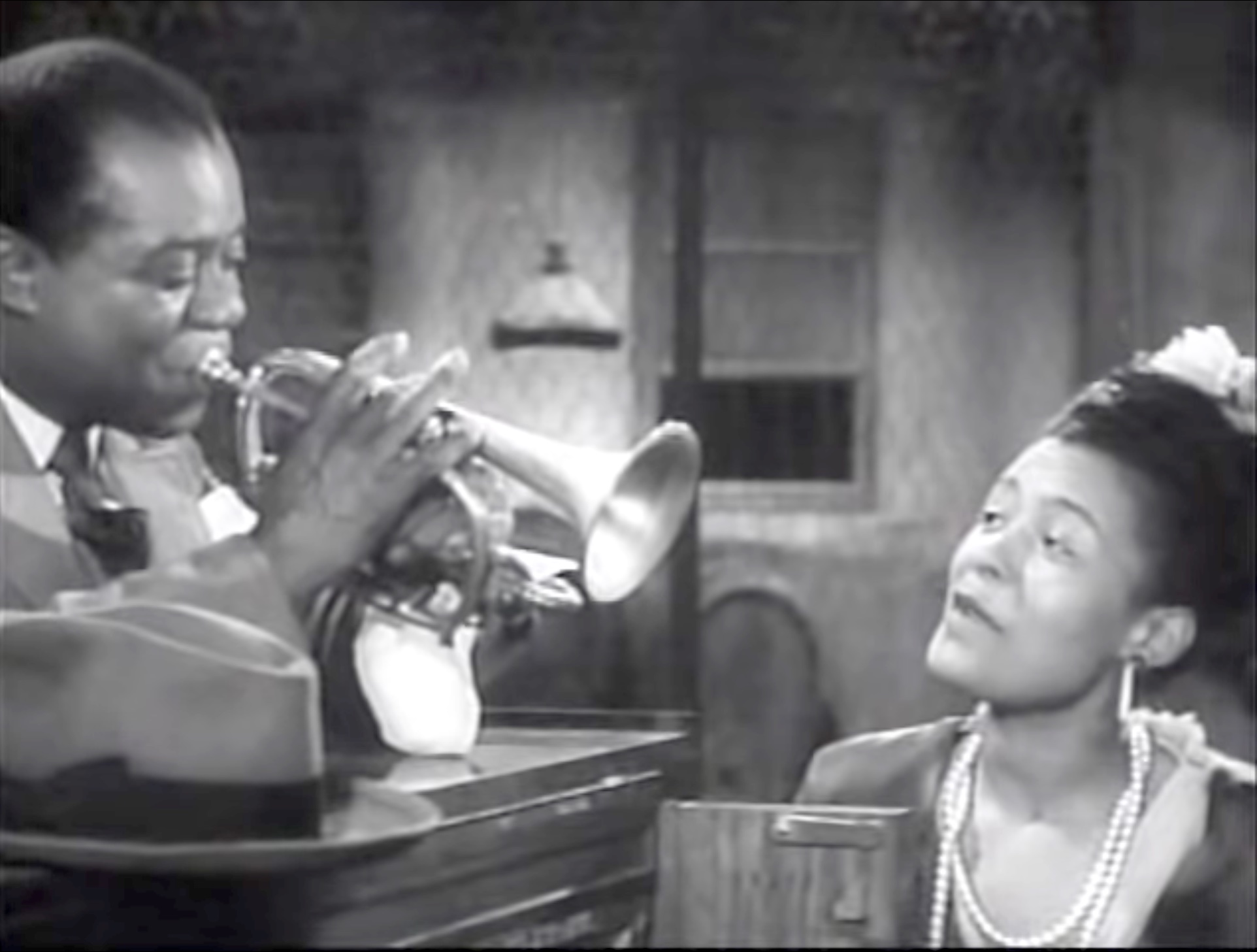 Song lyrics to Do you know what is means to miss New Orleans (1947) by Louis Alter and Edgar De Lange, Played by Louis Armstrong and His Band and sung by Billie Holiday in the movie New Orleans