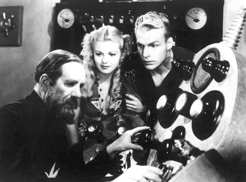 Dr. Alexis Zarkov takes off in a rocket ship to Mongo with Flash Gordon and Dale Arden as his assistants in "Spaceship to the Unknown"