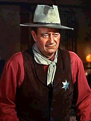 John Wayne as Sheriff John T. Chance in Rio Bravo
