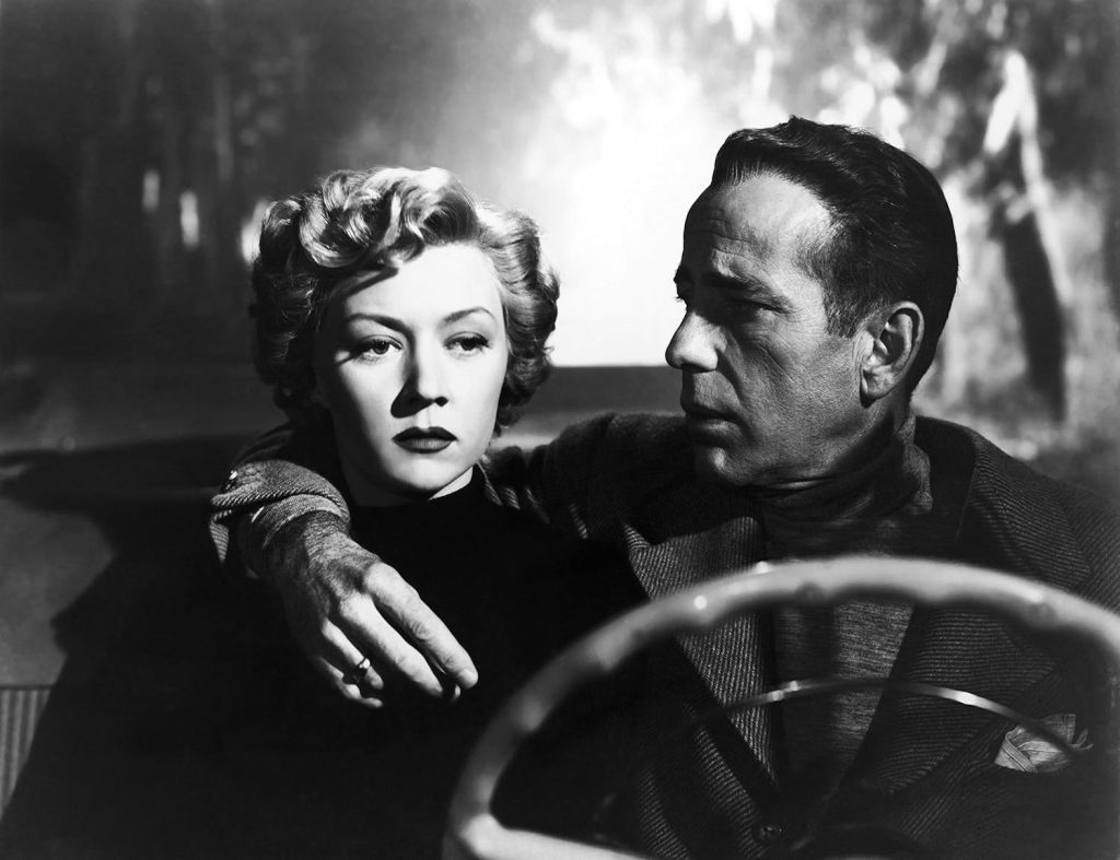 Gloria Grahame and Humphrey Bogart go for a drive in "In a Lonely Place"