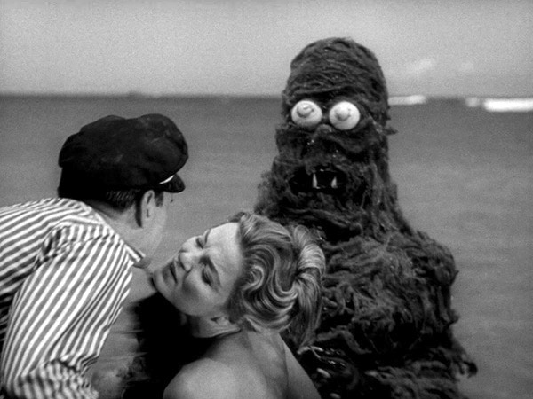 The monster fatally interrupts a tender moment in Creature from the Haunted Sea