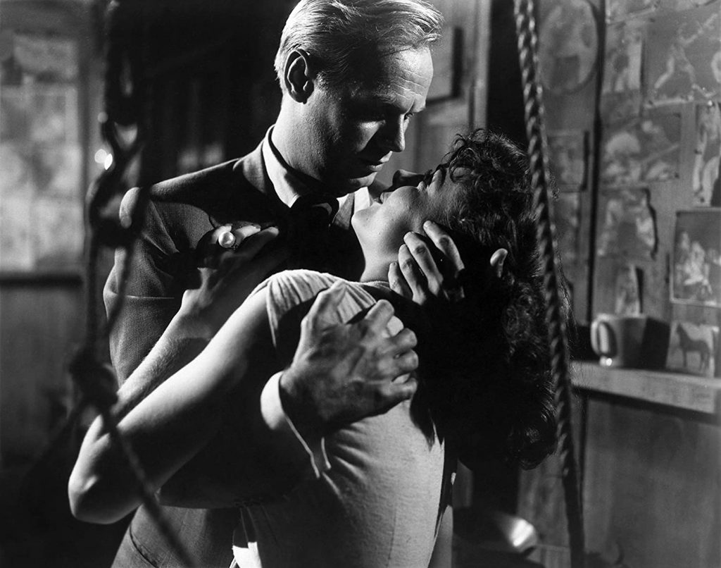 Romantic moment between Richard Widmark and Jean Peters