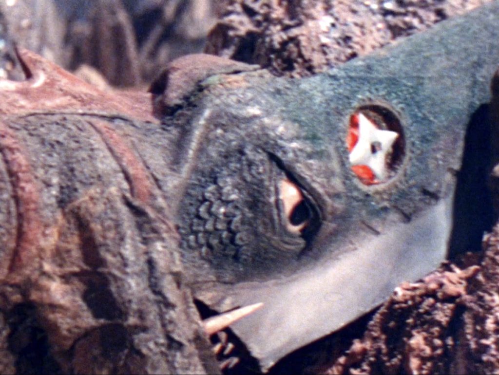 In Attack of the Monsters, Guiron launches a shuriken out of his head at Gamera?!?