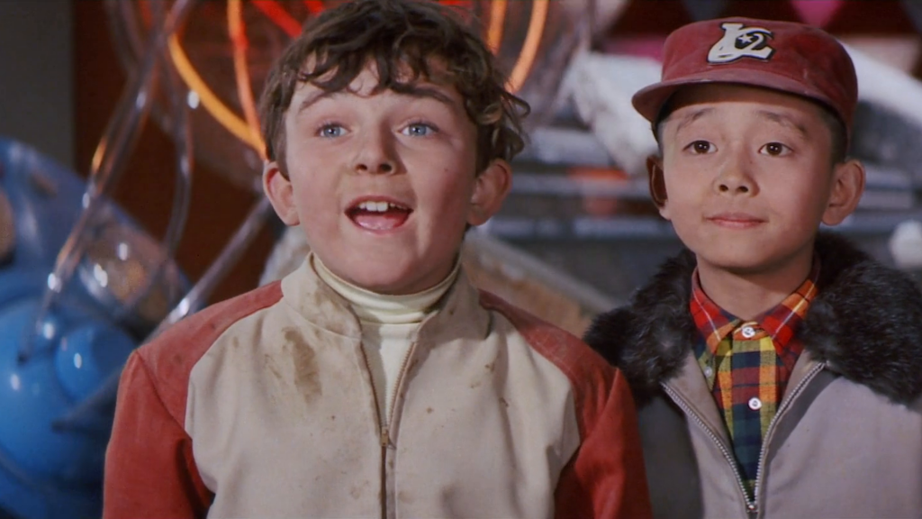 The two young boys, dreaming of donuts and milk …