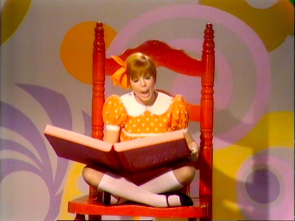 Vicki reading th story of Cinderumplewhite