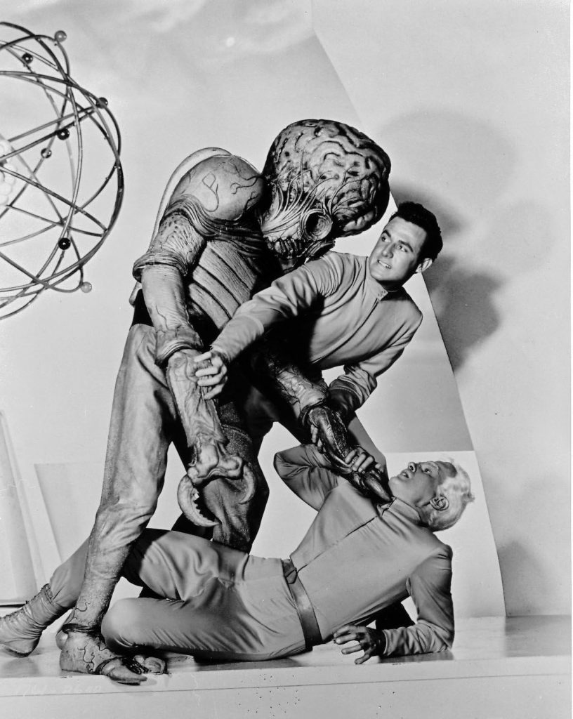 Publicity photo of mutant attacking Reason and Exeter
